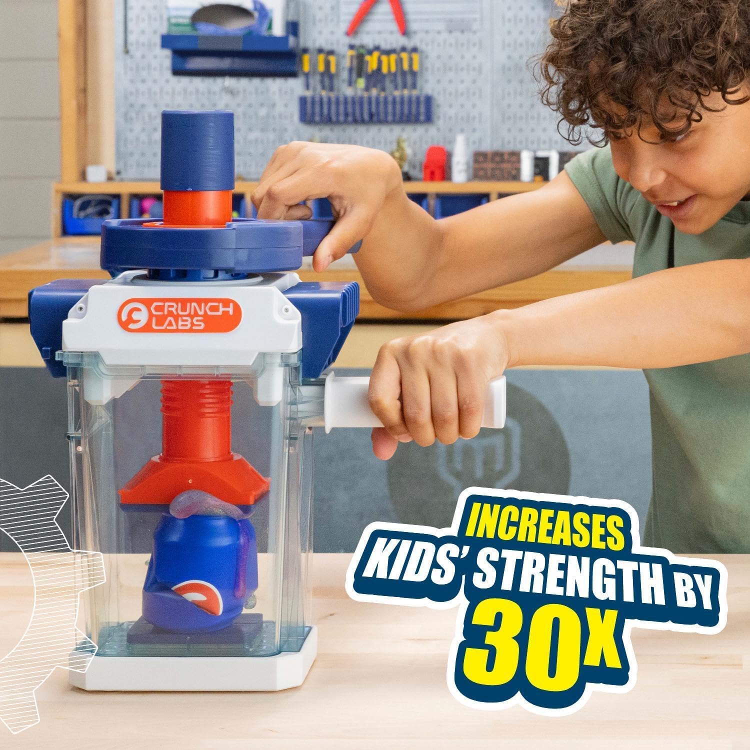 A child turning the Crunchinator wrench handle to crush an object
