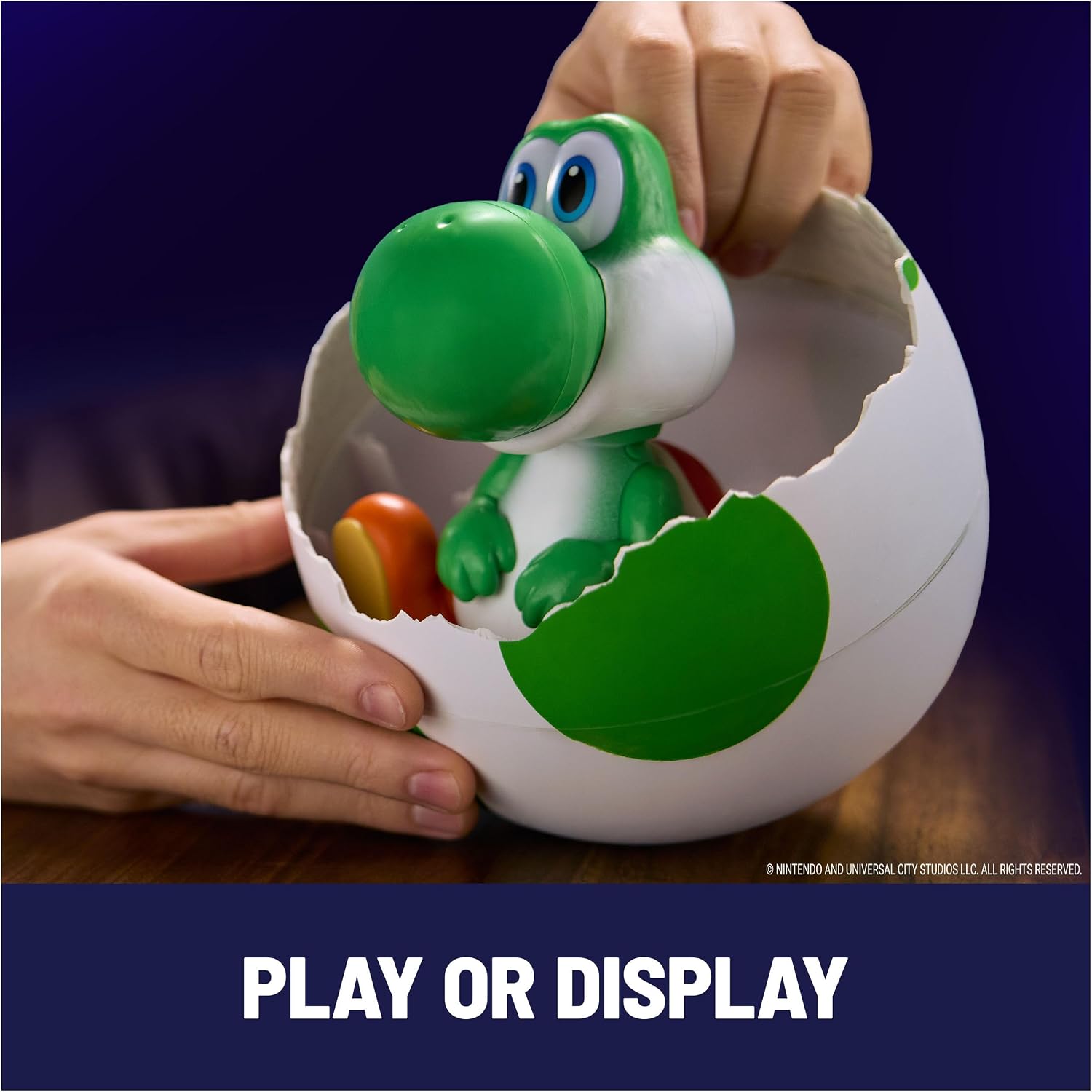 Yoshi sitting in the bottom half of the egg used as a stand