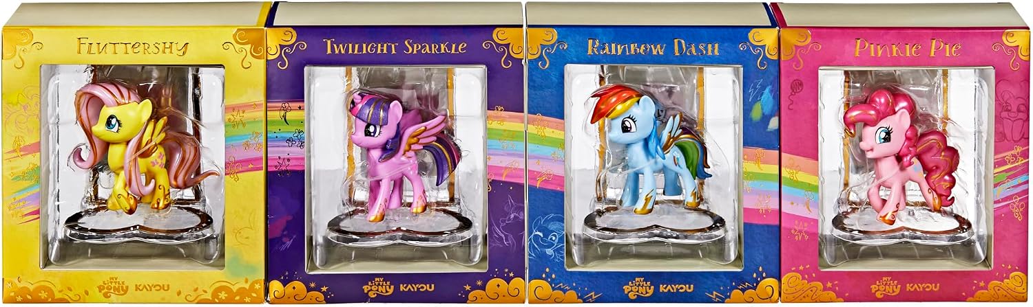 The four Friendship in the Cards figures in their book-style packaging